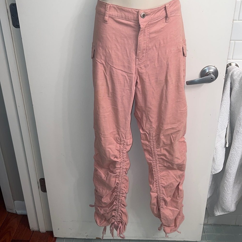 Bubblegum 15/16 dusty rose cords with cinched calves to ankles.